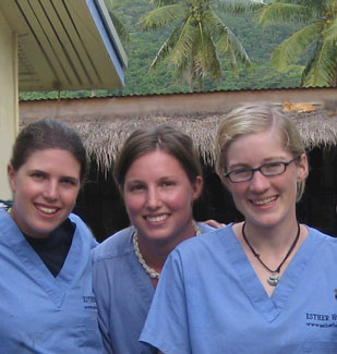 3 volunteers and a cat